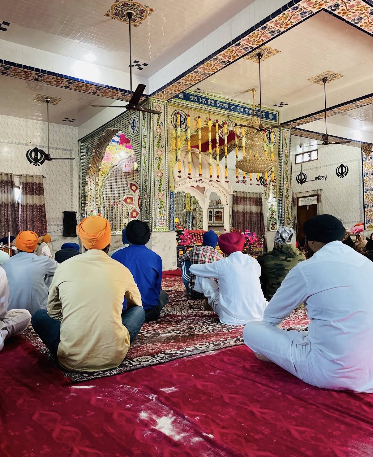 Sangat seated inside Gurudwara Sahib, Mandkulla